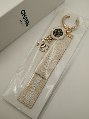 CHANEL Gold & White Camellia Logo Keychain Brand New In Original Packaging
